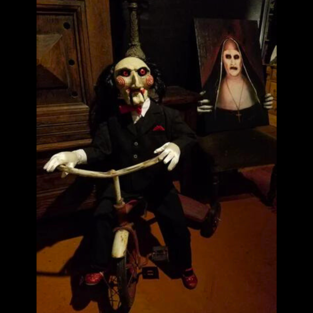 Enigmatic Billy Puppet life-sized halloween doll, inspired by the Saw series, perfect for horror collectors